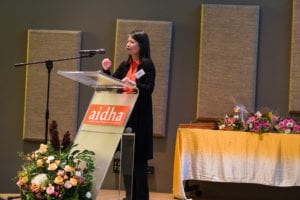 Jacqueline Loh (Jackie) addressing the audience at the graduation ceremony at Aidha 2017